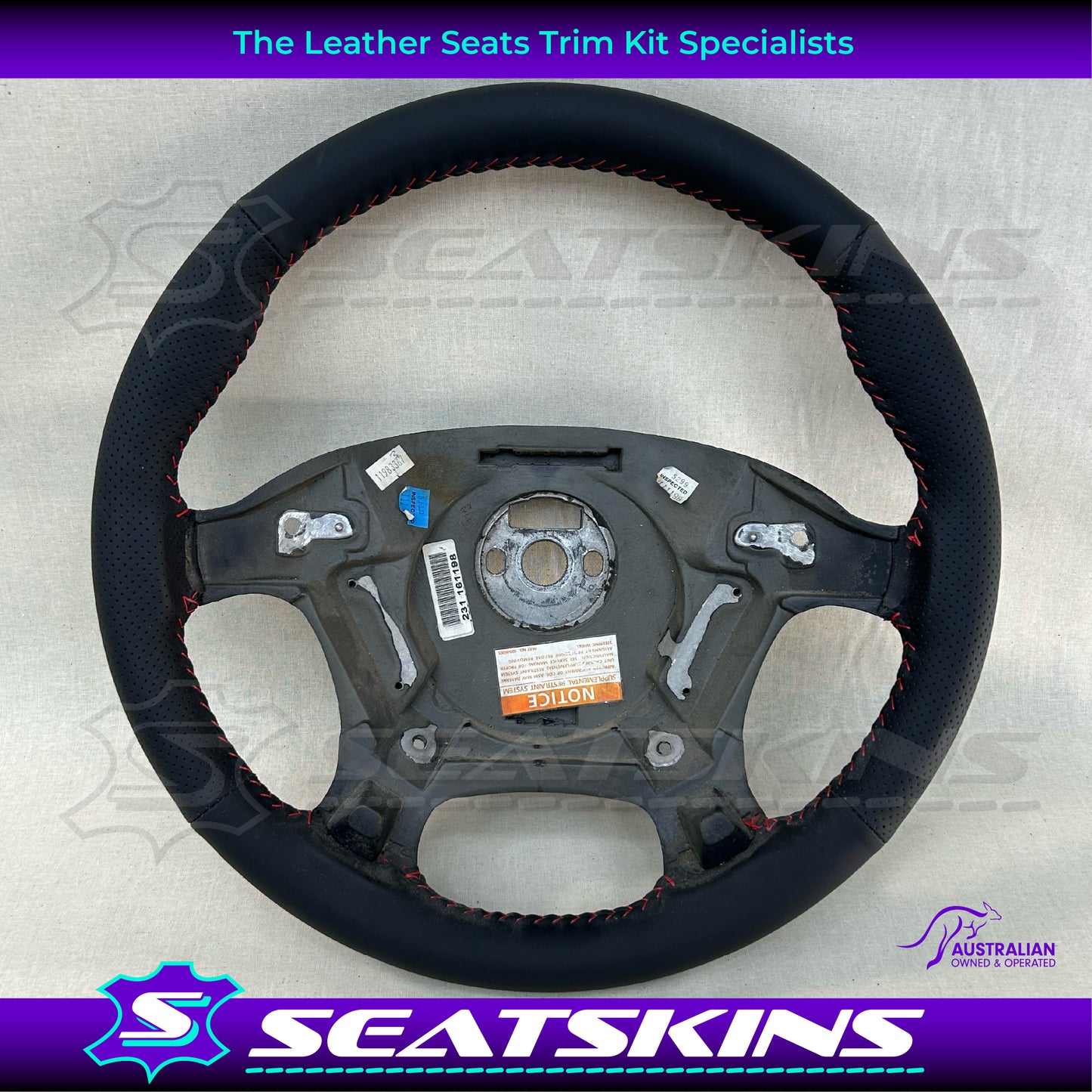 STEERING WHEEL TO FIT HOLDEN VT/VX ANTHRACITE LEATHER RETRIMMED WITH RED STITCH