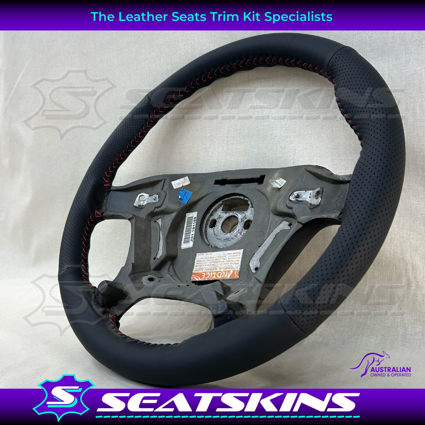 STEERING WHEEL TO FIT HOLDEN VT/VX ANTHRACITE LEATHER RETRIMMED WITH RED STITCH